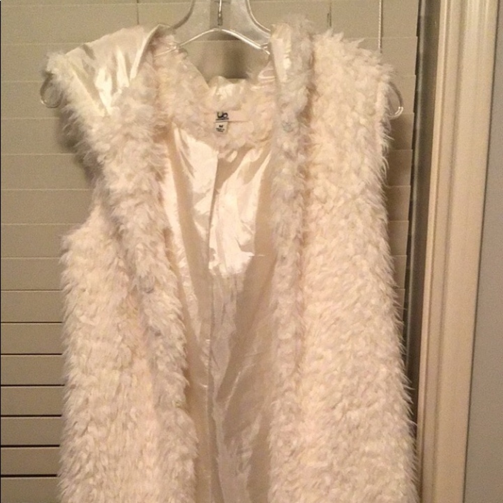 White fur vest